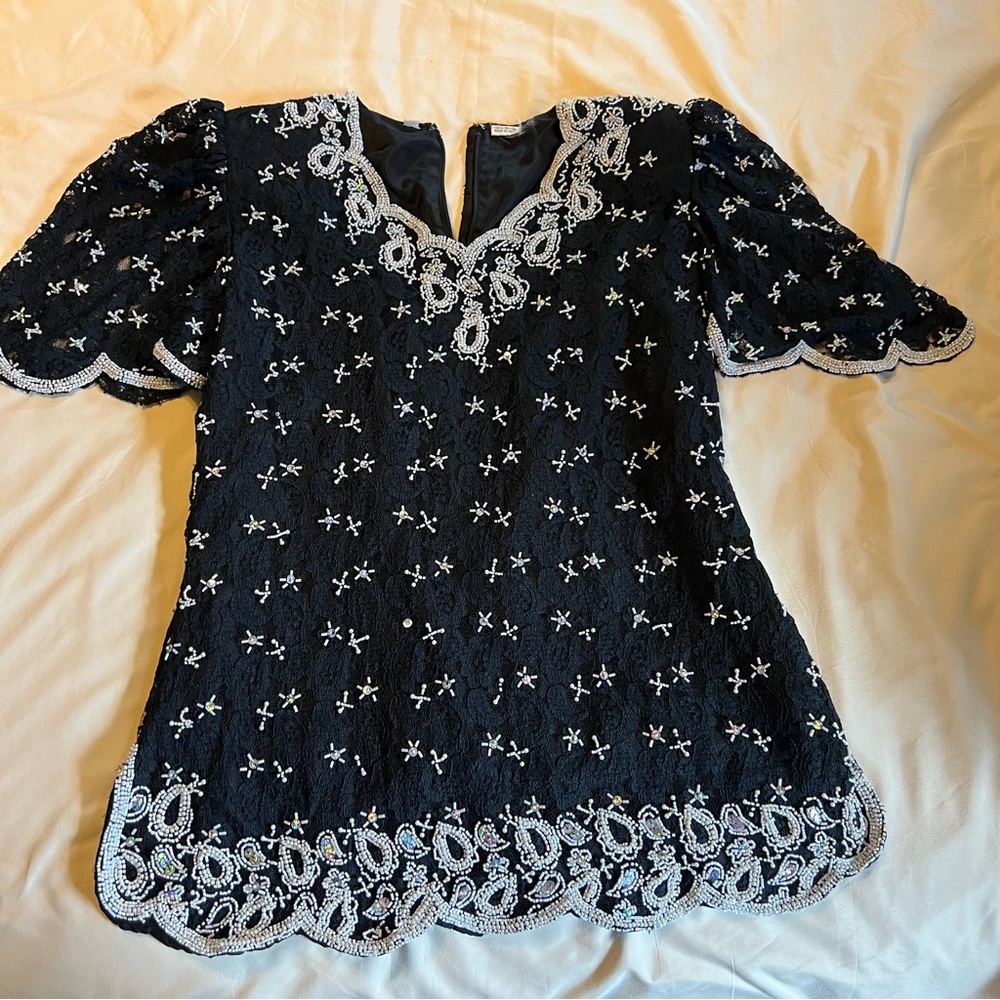 Chic Black Blouse with White Detailing